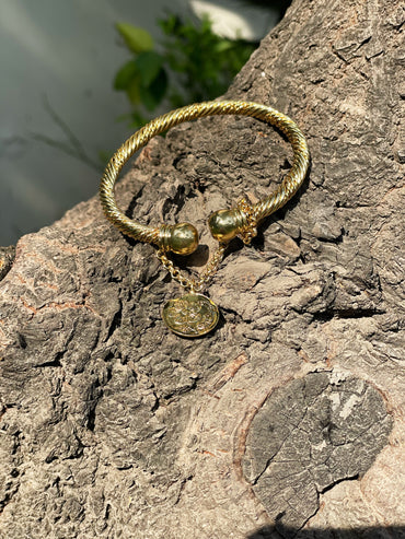 Gold twist coin cuff