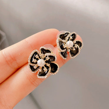 Black enamel flowers